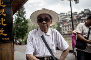 fenghuang china by rail stefano majno asia old man.jpg